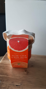 Body scrub met borstel Oranje